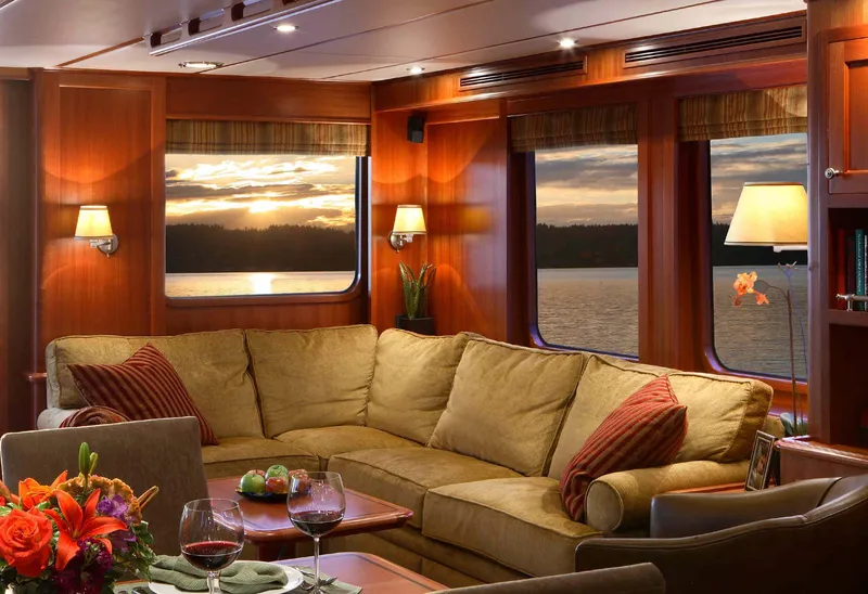 Slide: The Image of Luxurious interior of 2025 Northern Marine 64 yacht with sunset view through windows. - 3