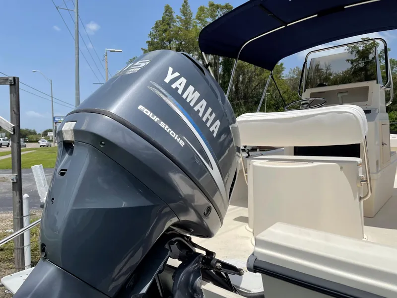 Slide: The Image of 2004 Parker 1801 Center Console boat with Yamaha four-stroke outboard motor. - 4