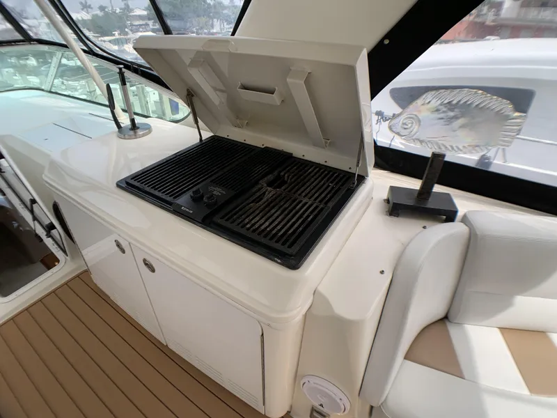 Slide: The Image of Outdoor grill on the deck of a 2006 Carver 56 Voyager yacht. - 11