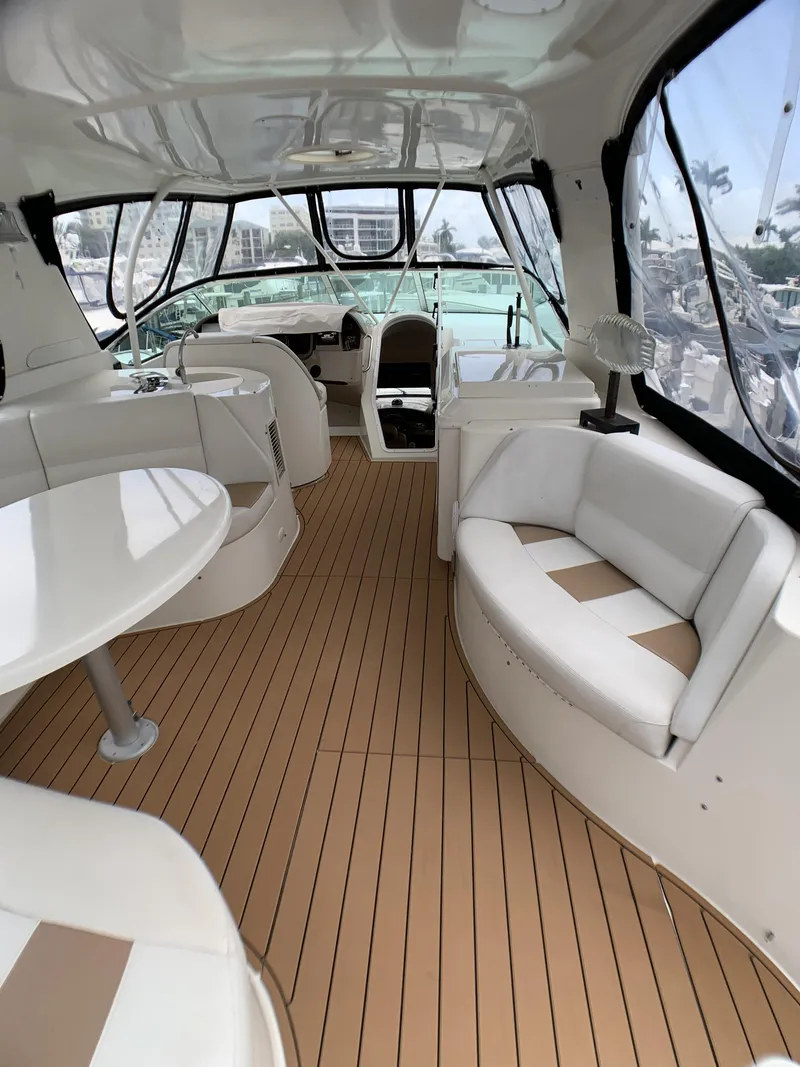 Slide: The Image of Interior of a 2006 Carver 56 Voyager yacht with spacious seating and modern design. - 21