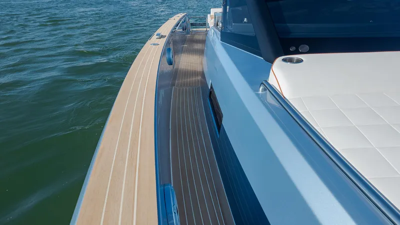Slide: The Image of 2022 Pardo Yachts 43, sleek deck design, cruising on open water. - 11