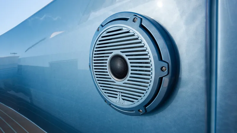 Slide: The Image of Speaker on 2022 Pardo Yachts 43, mounted on sleek blue exterior. - 22