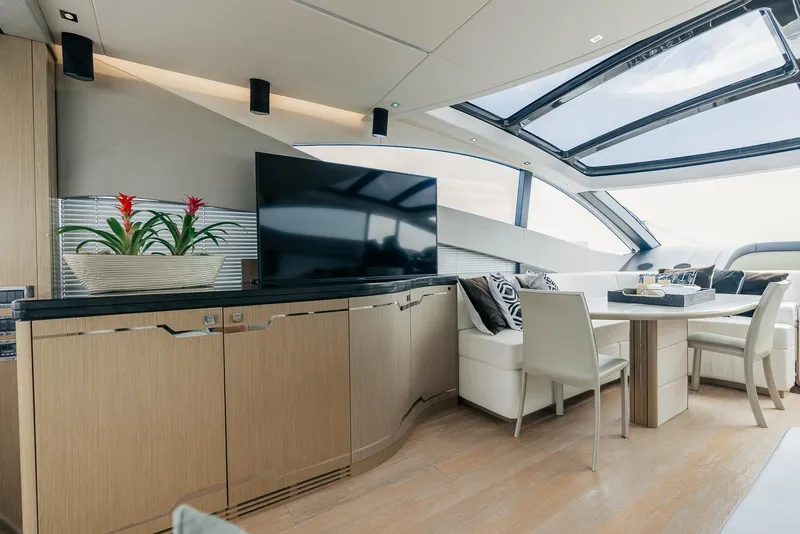 Slide: The Image of Luxurious interior of 2018 Sunseeker Predator 68 yacht with modern furnishings and skylight. - 20