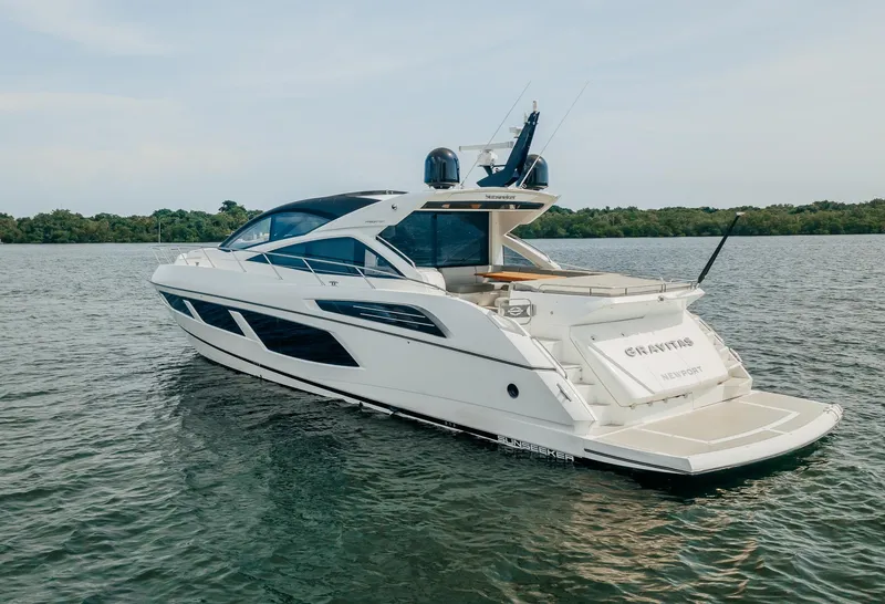 Slide: The Image of 2018 Sunseeker Predator 68 yacht on calm water. - 4