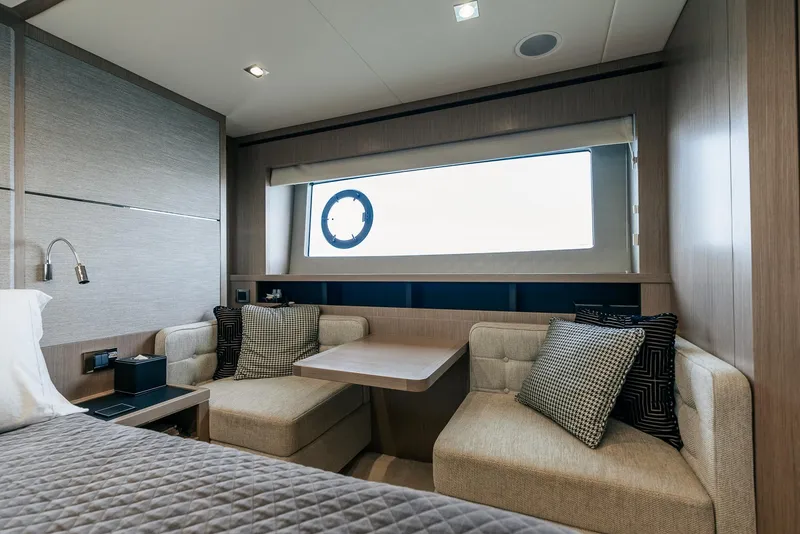 Slide: The Image of Luxurious interior of 2018 Sunseeker Predator 68 yacht with cozy seating area. - 41
