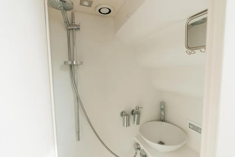 Slide: The Image of Modern bathroom in 2018 Sunseeker Predator 68 yacht with shower and sink. - 45