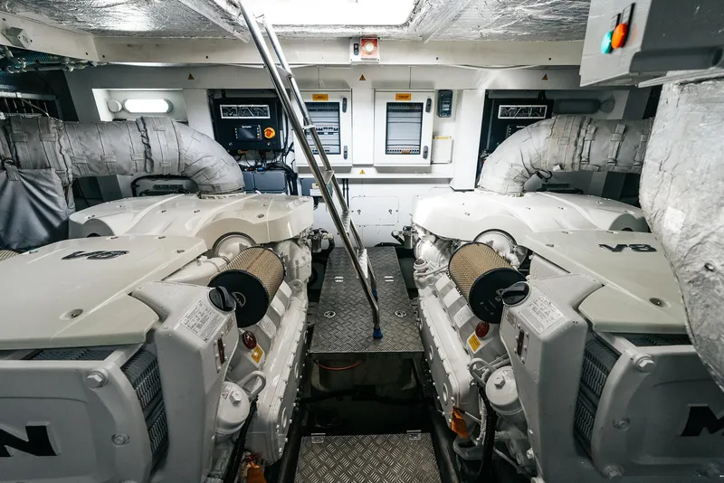 Slide: The Image of Engine room of a 2018 Sunseeker Predator 68 yacht with twin MAN V8 engines. - 47