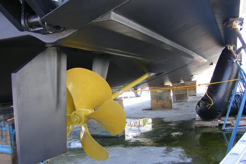 Slide: The Image of Close-up of the propeller and hull of a 2018 Sunseeker Predator 68 yacht. - 49