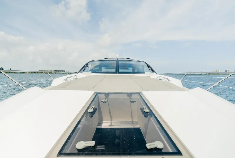 Slide: The Image of 2018 Sunseeker Predator 68 yacht on open water, front deck view. - 7