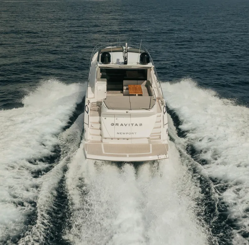 Slide: The Image of 2018 Sunseeker Predator 68 yacht cruising on open water. - 9