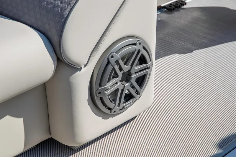 Slide: The Image of 2023 Premier 220 Castaway boat interior speaker and seating detail. - 23