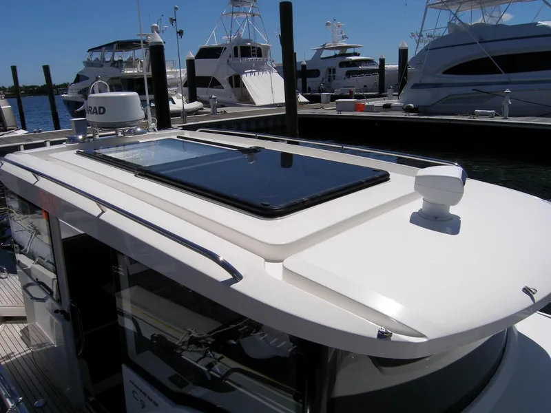 Slide: The Image of Nimbus C9 2025 model yacht docked at marina, showcasing sleek design and advanced radar system. - 3