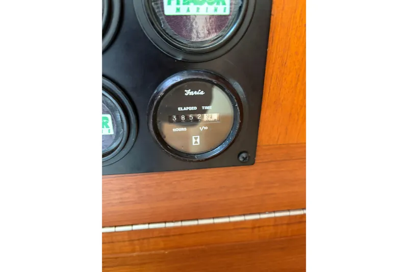 Slide: The Image of Hour meter on 2003 Cabo 45 Express boat dashboard, showing 3852.9 hours elapsed. - 17