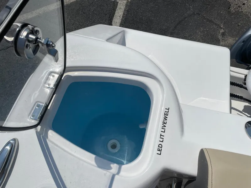 Slide: The Image of LED-lit livewell on 2022 Tidewater 220 CC Adventure boat. - 6