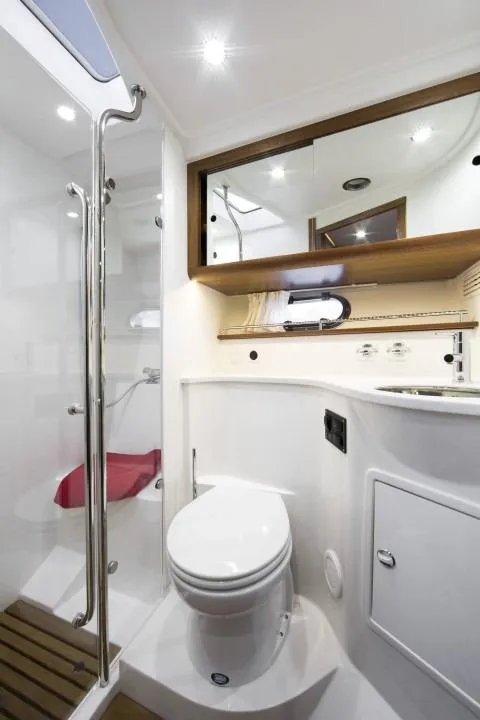 Slide: The Image of Modern bathroom in 2024 Nimbus 405 Coupé yacht with shower and toilet. - 13
