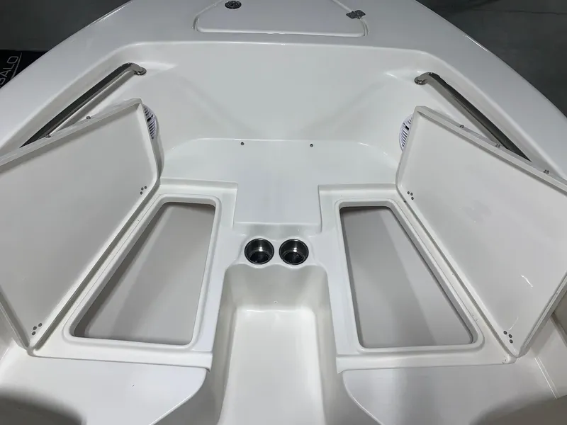 Slide: The Image of 2024 Key West 203 FS boat with open storage compartments. - 11