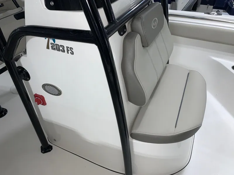 Slide: The Image of 2024 Key West 203 FS boat interior seating and console. - 12