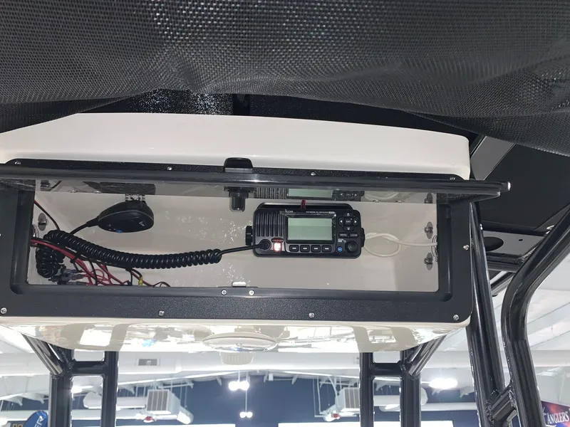 Slide: The Image of 2024 Key West 203 FS boat console with mounted marine radio. - 17