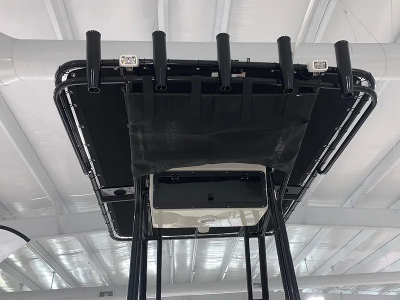 Slide: The Image of 2024 Key West 203 FS boat T-top with rod holders and LED lights. - 7