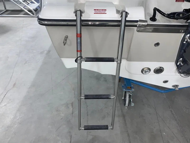 Slide: The Image of 2024 Key West 203 FS boat with a stainless steel swim ladder. - 8