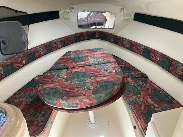 Slide: The Image of Interior cabin of a 1997 Donzi 27 LXC boat with patterned seating. - 8