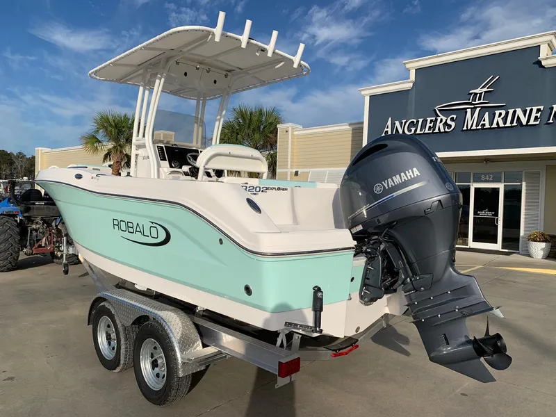 Slide: The Image of 2024 Robalo R202 Explorer boat with Yamaha engine at Anglers Marine dealership. - 1