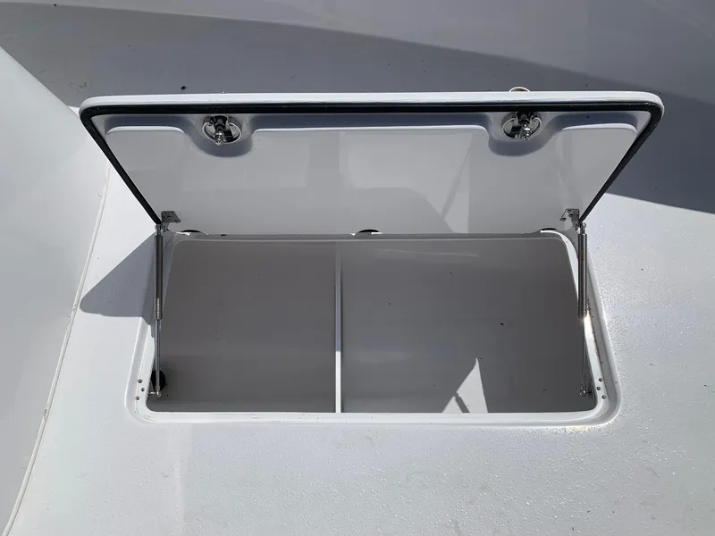 Slide: The Image of Open storage compartment on 2024 Cape Horn 31T boat. - 10