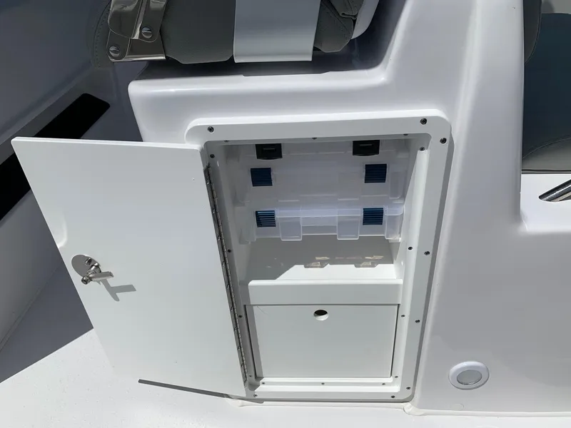 Slide: The Image of 2024 Cape Horn 31T boat storage compartment with open door. - 12
