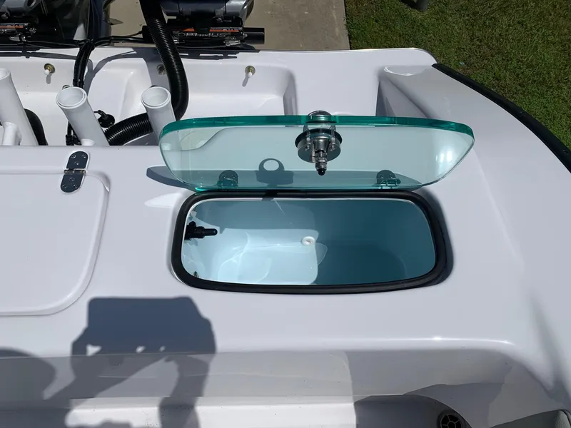 Slide: The Image of 2024 Cape Horn 31T boat with open storage compartment. - 13