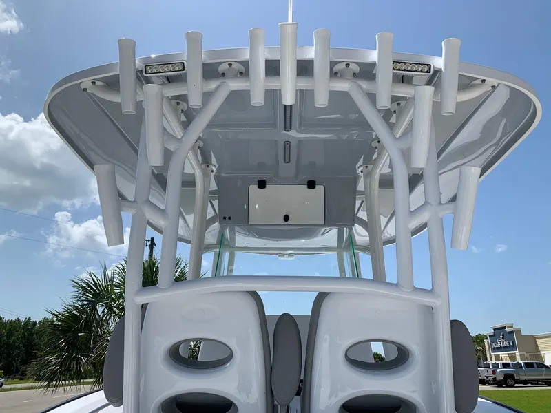 Slide: The Image of 2024 Cape Horn 31T boat with T-top and rod holders. - 4