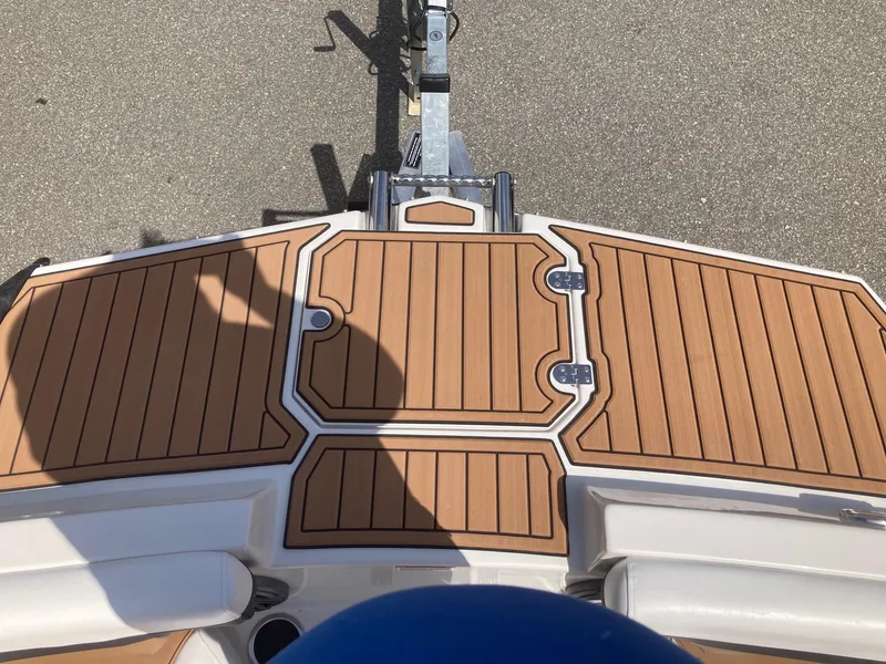 Slide: The Image of 2024 Starcraft SVX 191 boat deck with wood finish. - 12