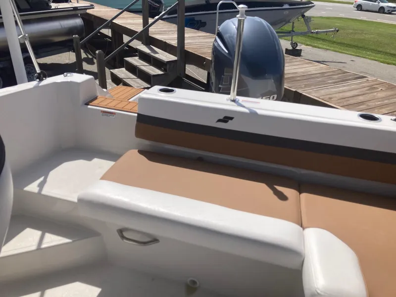 Slide: The Image of 2024 Starcraft SVX 191 boat interior with tan and white seating. - 3