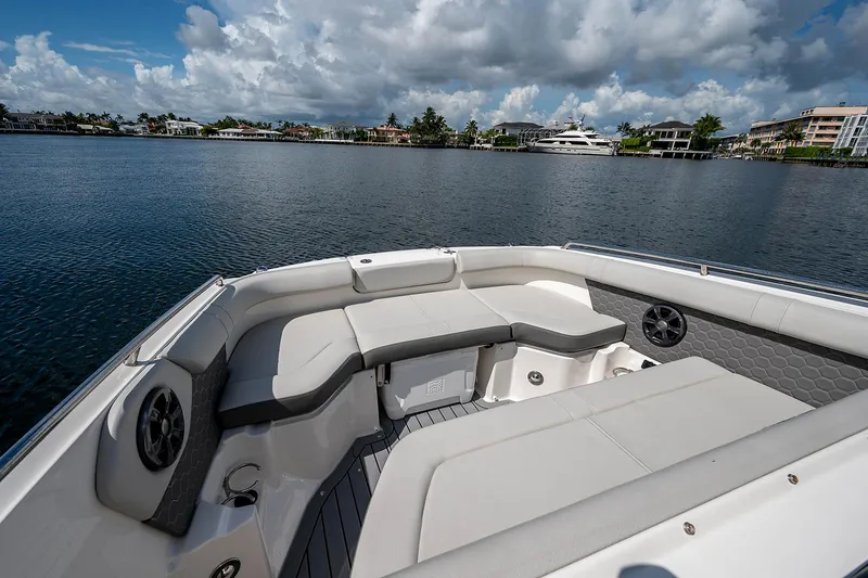 Slide: The Image of 2021 Sea Ray 25 SDX boat interior with waterfront view. - 17