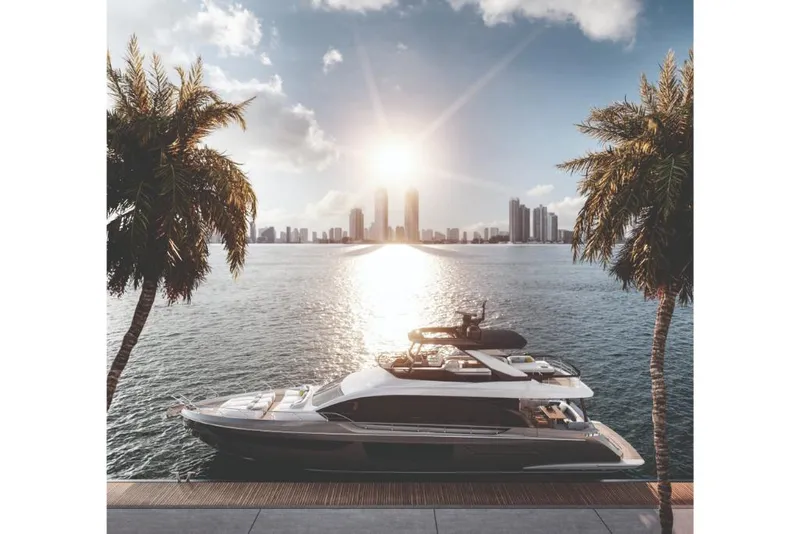 Slide: The Image of Luxury 2023 Azimut 68 yacht docked at sunset with city skyline and palm trees. - 2
