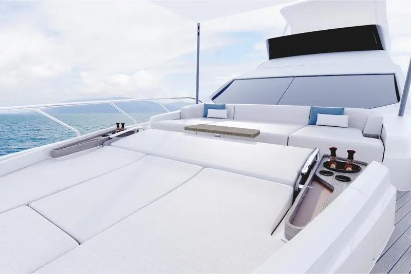 Slide: The Image of Luxurious 2023 Azimut 68 yacht with spacious sunbathing area and ocean view. - 3