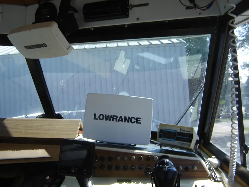 Slide: The Image of Century 26 boat dashboard with Lowrance navigation system, 1980 model. - 21
