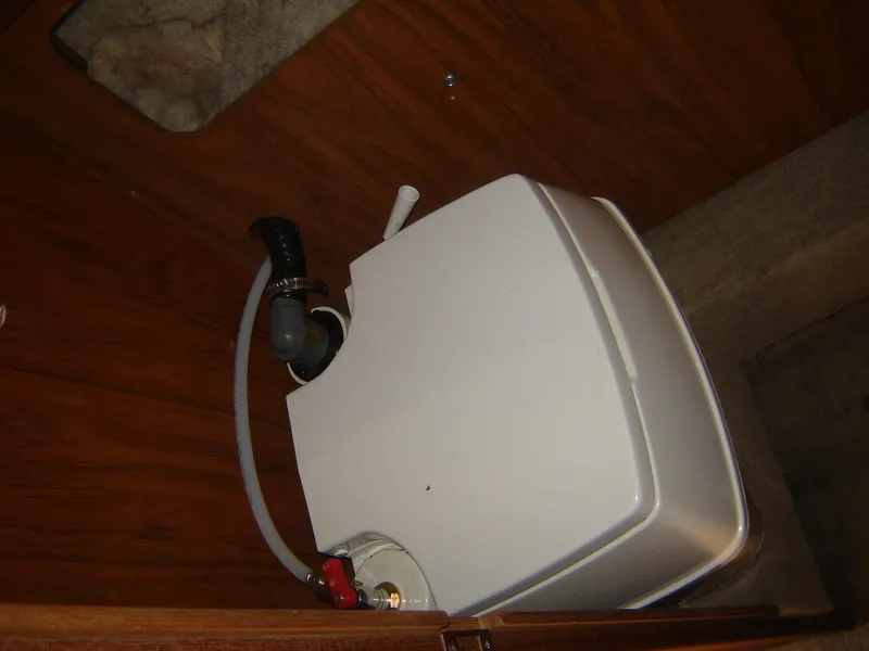 Slide: The Image of Boat interior plumbing system in a 1980 Century 26 model. - 33