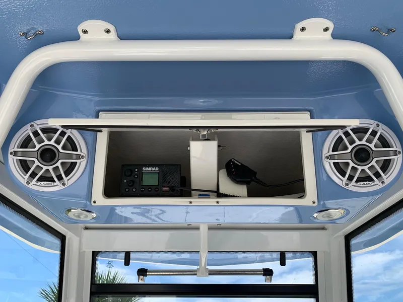 Slide: The Image of 2024 Robalo 266 Cayman boat electronics and speaker system. - 12