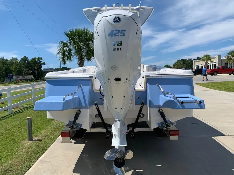 Slide: The Image of 2024 Robalo 266 Cayman boat with Yamaha 425 V8 engine, rear view. - 3
