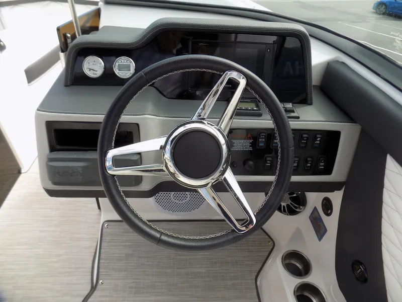 Slide: The Image of Steering wheel and dashboard of 2019 Regal 26 FasDeck boat. - 7