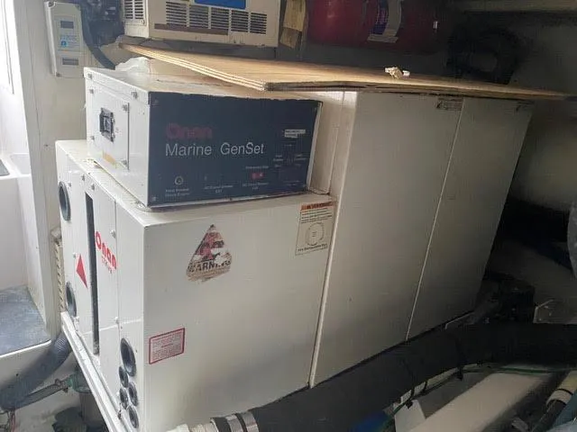 Slide: The Image of Onan Marine GenSet in 2003 Viking 50 Open engine room. - 23