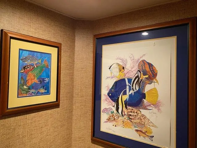 Slide: The Image of Framed tropical fish artwork on a 2003 Viking 50 Open yacht. - 42
