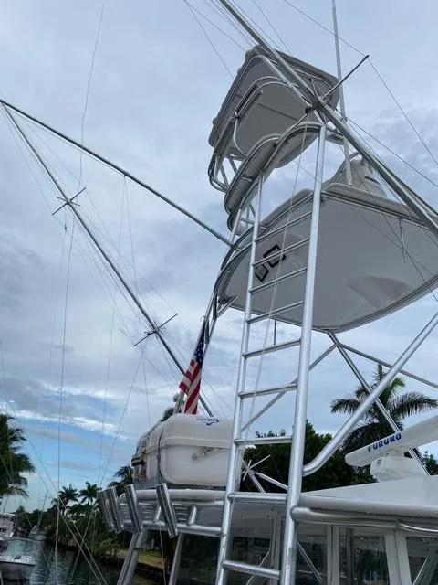 Slide: The Image of 2003 Viking 50 Open yacht with tower and American flag. - 47