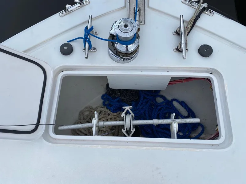 Slide: The Image of Anchor locker of a 2003 Viking 50 Open boat with ropes and winch. - 7
