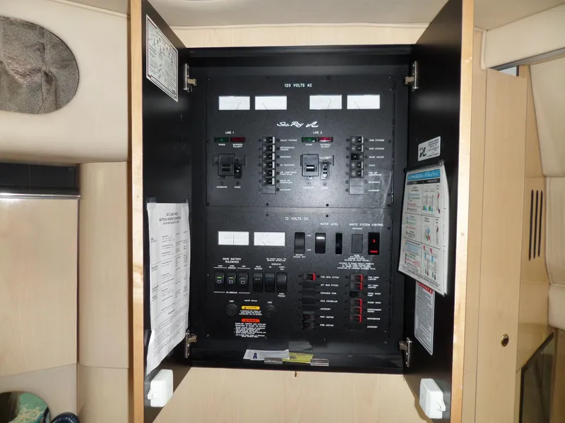 Slide: The Image of Electrical control panel inside a 2003 Sea Ray 380 Sundancer. - 35