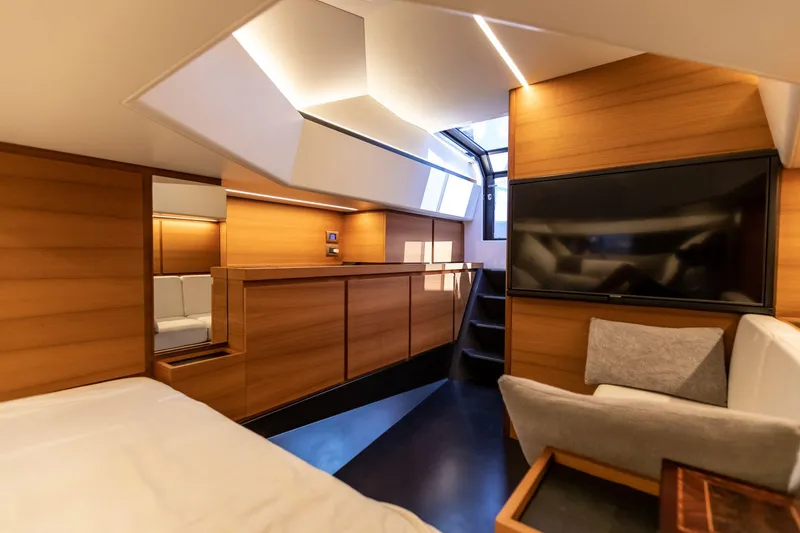 Slide: The Image of Luxurious interior of 2021 Wally 48 WALLYTENDER X yacht with modern wood paneling. - 24