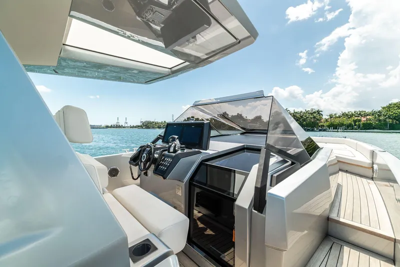 Slide: The Image of 2021 Wally 48 WALLYTENDER X luxury yacht cockpit with modern navigation system. - 7