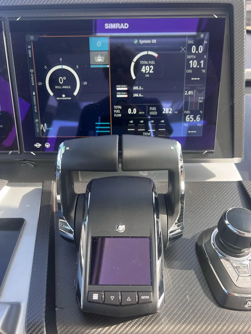 Slide: The Image of Close-up of 2021 Wally 48 WALLYTENDER X control panel and Simrad display. - 9