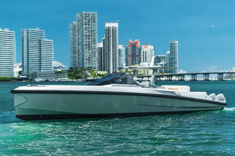 The Image of 2021 Wally wallytender48X yacht cruising near city skyline on a sunny day. - 0