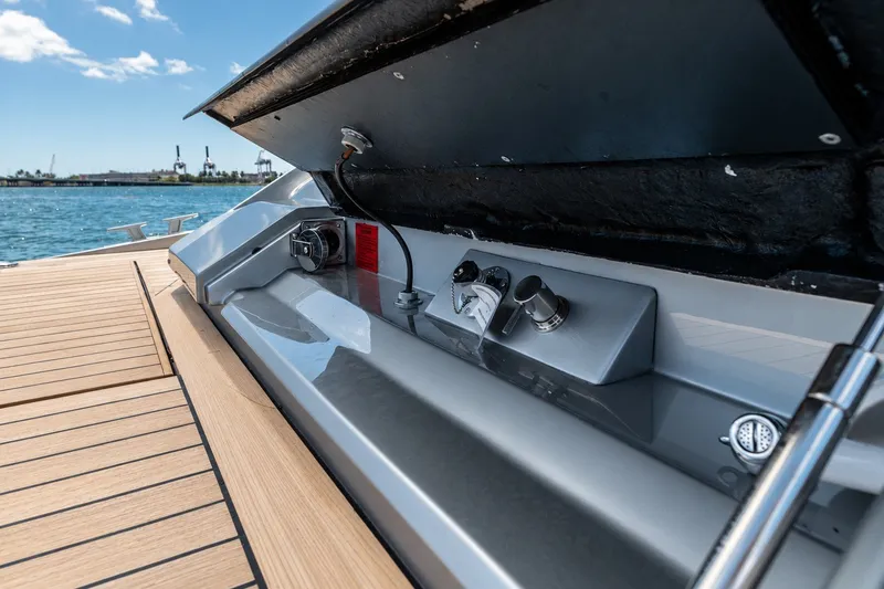 Slide: The Image of 2021 Wally wallytender48X yacht deck with open storage compartment, ocean view. - 25